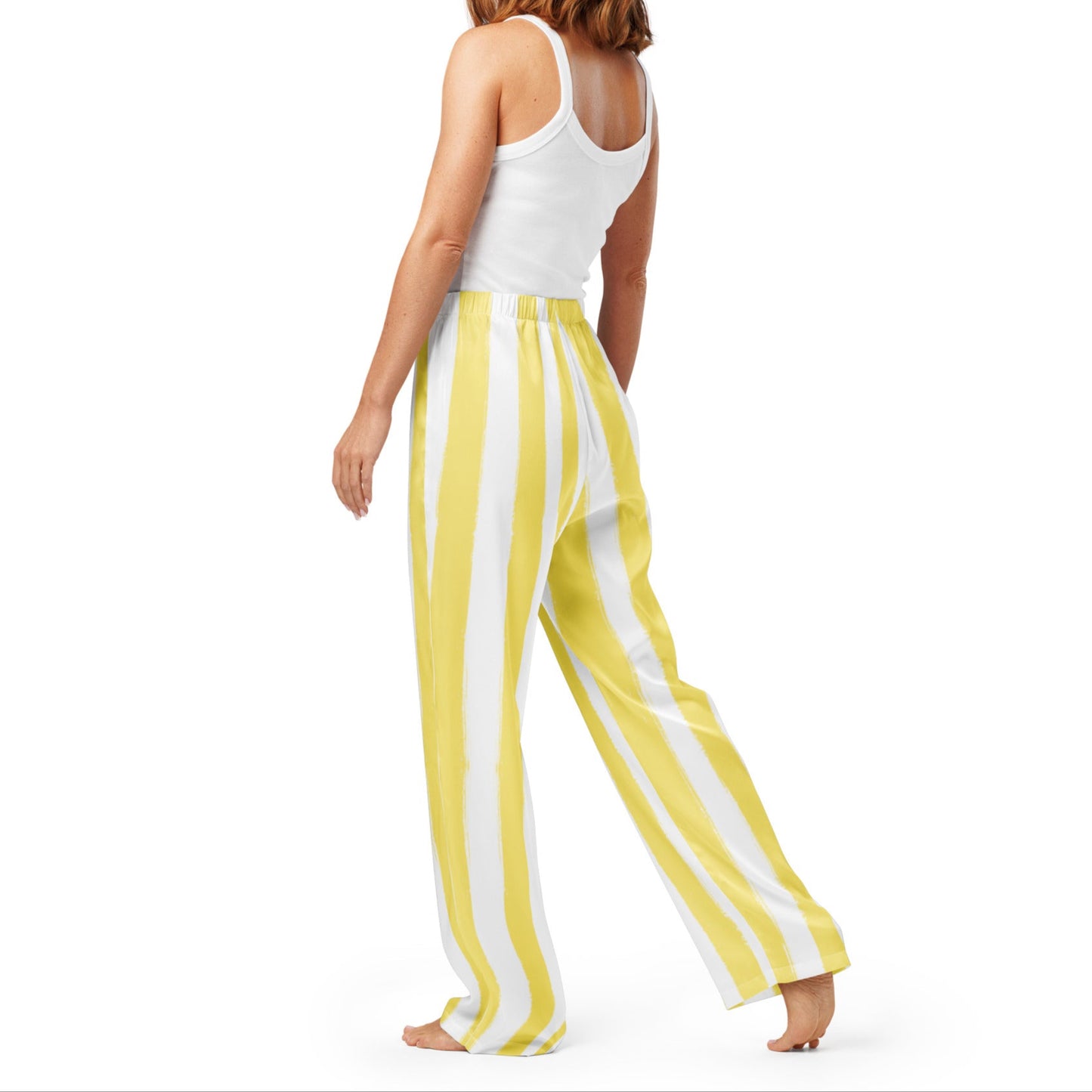 Side profile of butter yellow striped pajama pants with piping detail and relaxed cut, ideal for lounging in style.