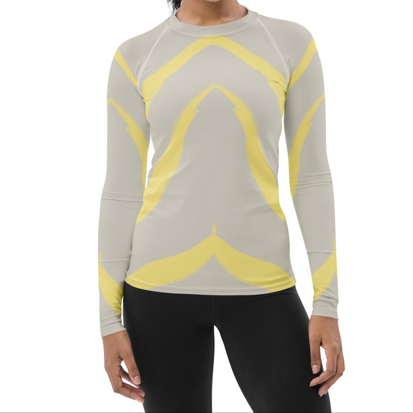 Model wearing butter yellow rash guard, highlighting UPF 50+ coverage