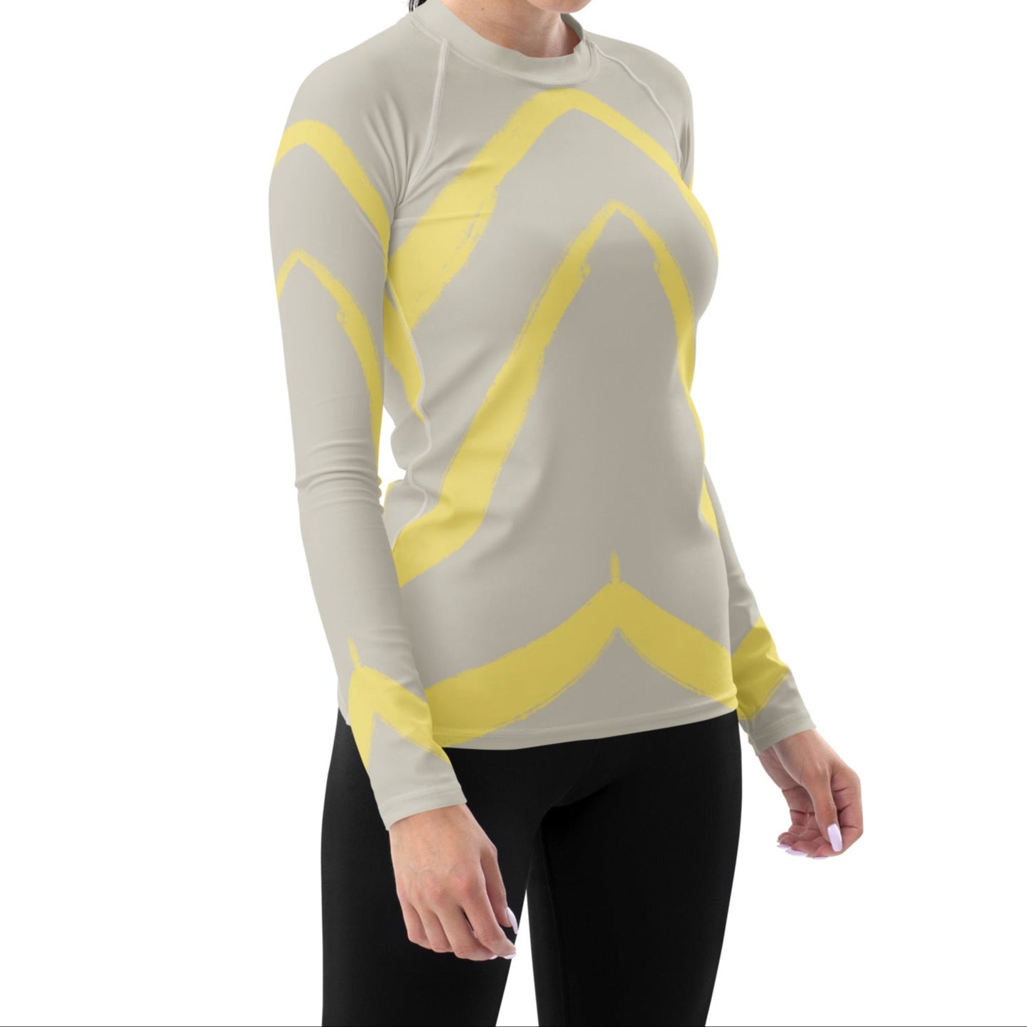 Front view of model in Panther & Palm butter yellow activewear top, highlighting fitted silhouette, extended length, and breathable stretch fabric.