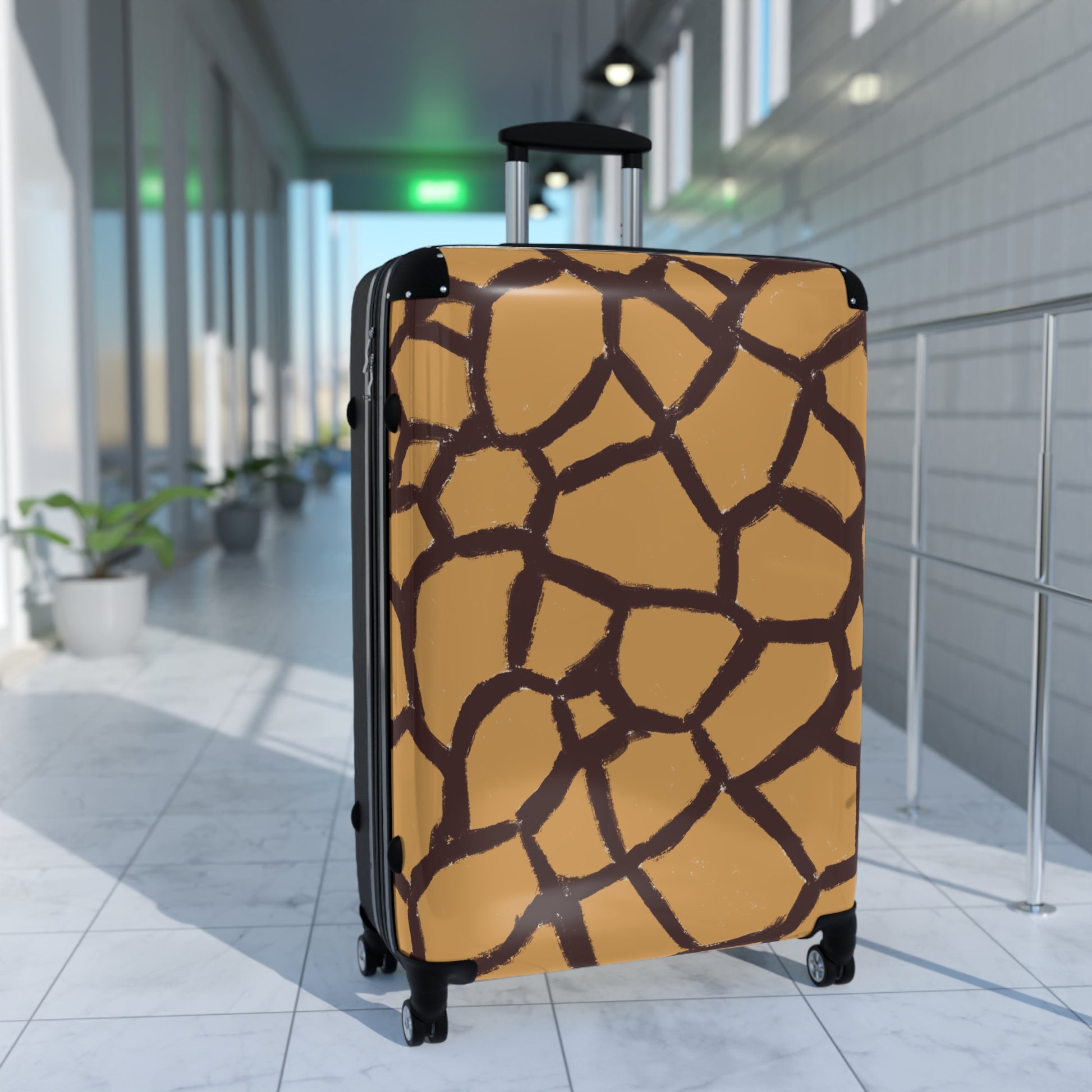 Giraffe print carry-on spinner suitcase with telescopic handle and 360° wheels, designed by Panther & Palm.