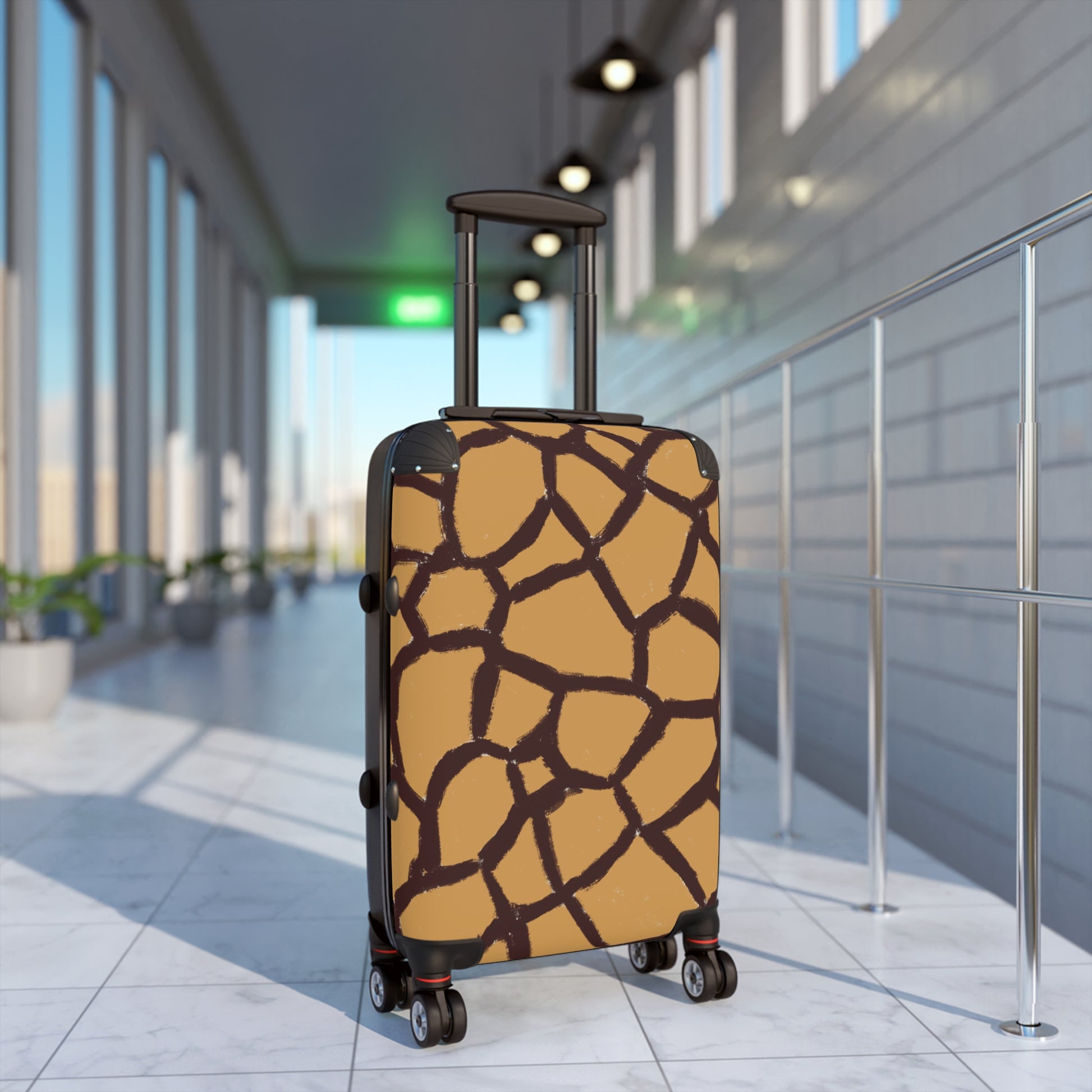 Panther & Palm giraffe print small carry-on durable hard shell spinner suitcase positioned in a modern airport terminal, ready for travel.