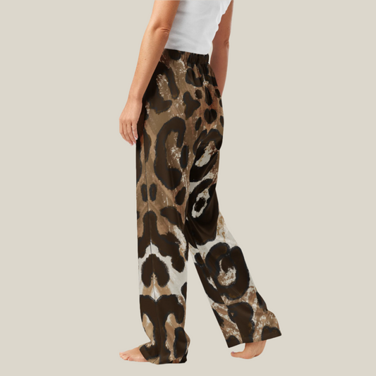 Side angle of glam leopard lounge pants styled casually, highlighting the straight-leg fit and luxe leopard print design.