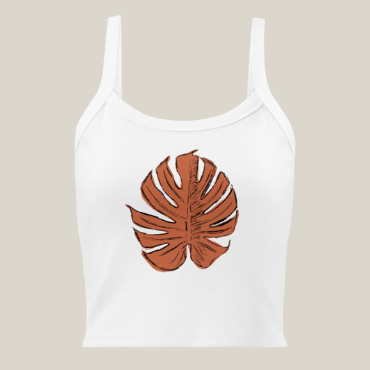 White Panther & Palm ribbed cotton tank top featuring terracotta monstera leaf illustration.